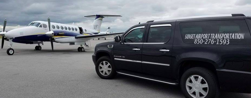 airport transportation vehicle next to private corporate jet in Panama City FL